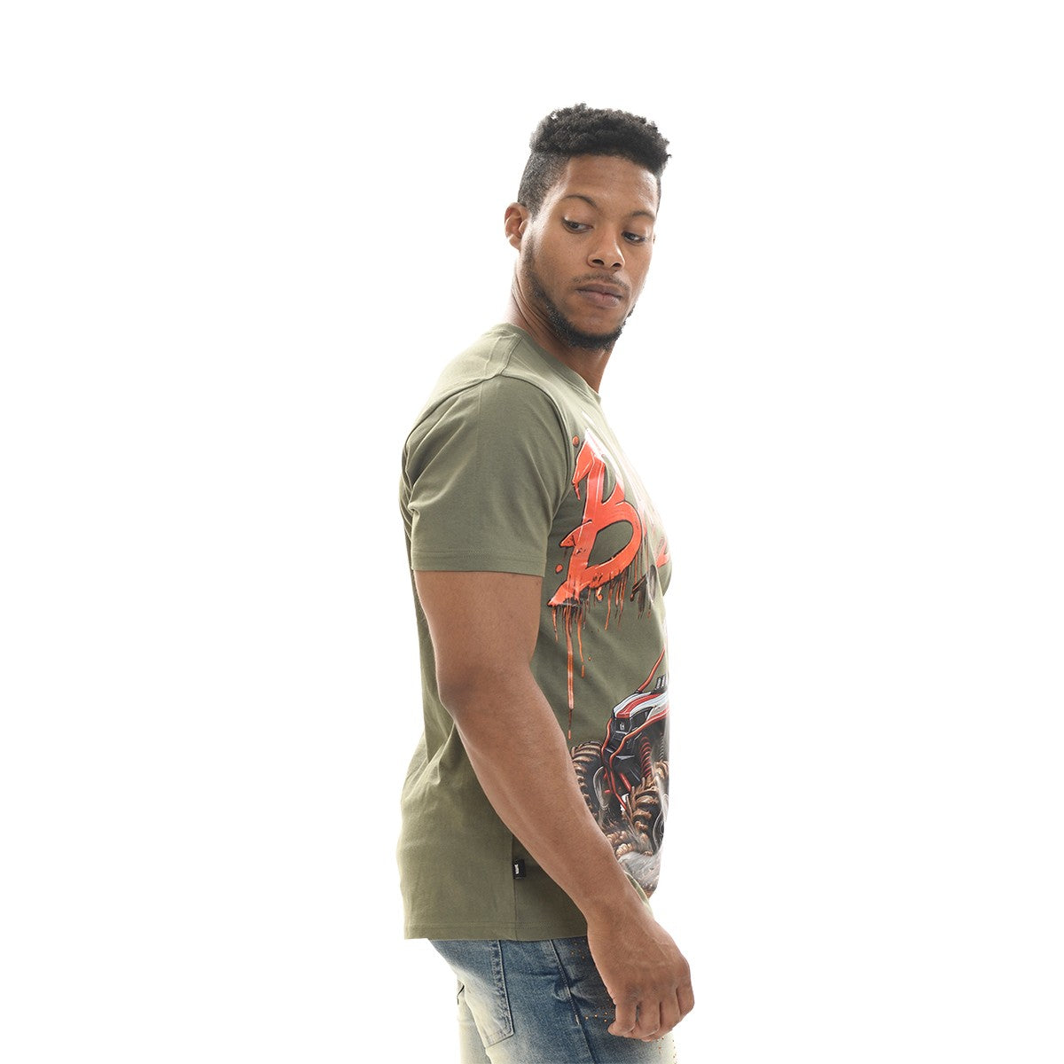 Man wearing a green t-shirt with a graphic design on a white background