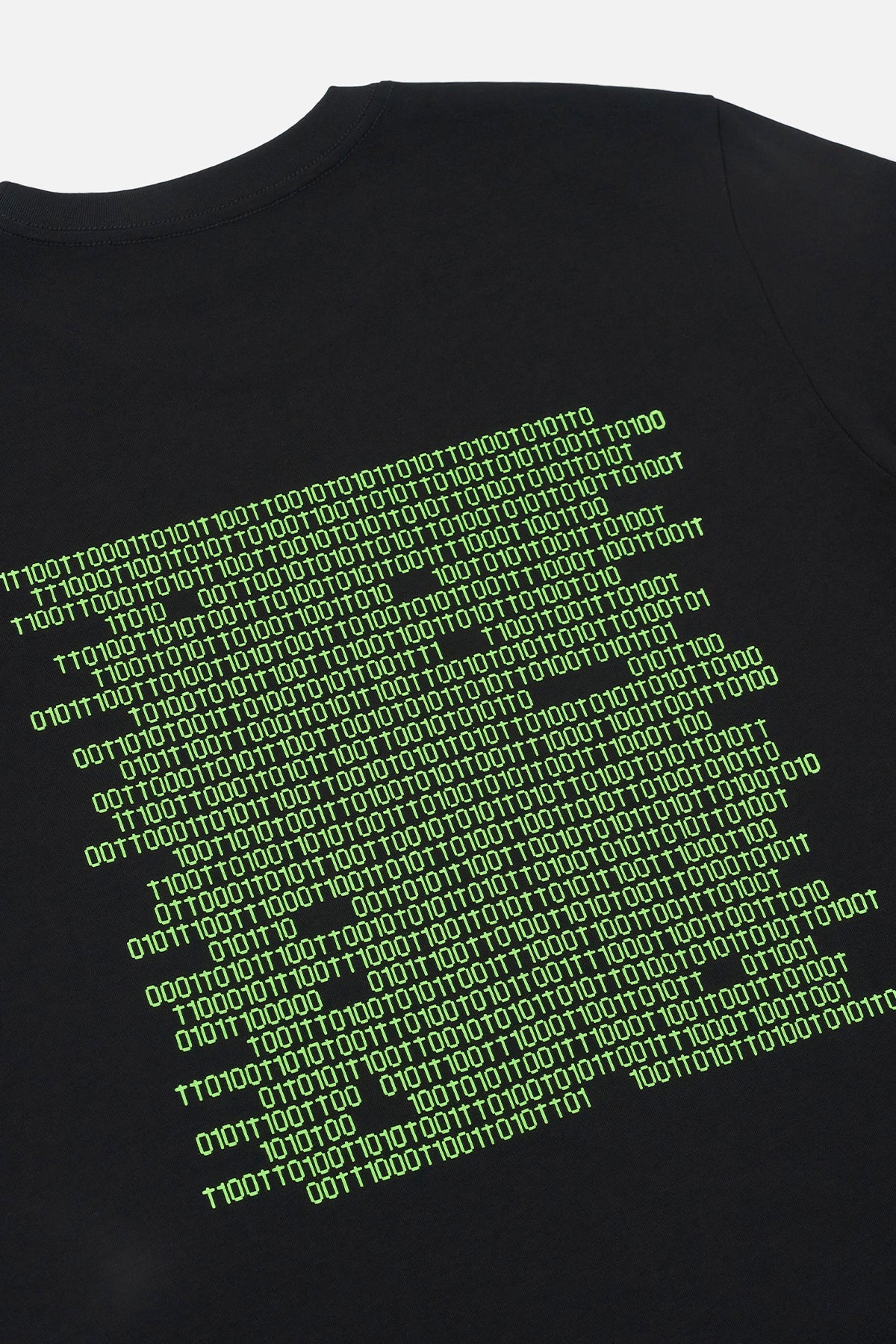 RTA Liam Short Sleeve Tee in black with glitch-strip chest logo and binary code graphic on back.