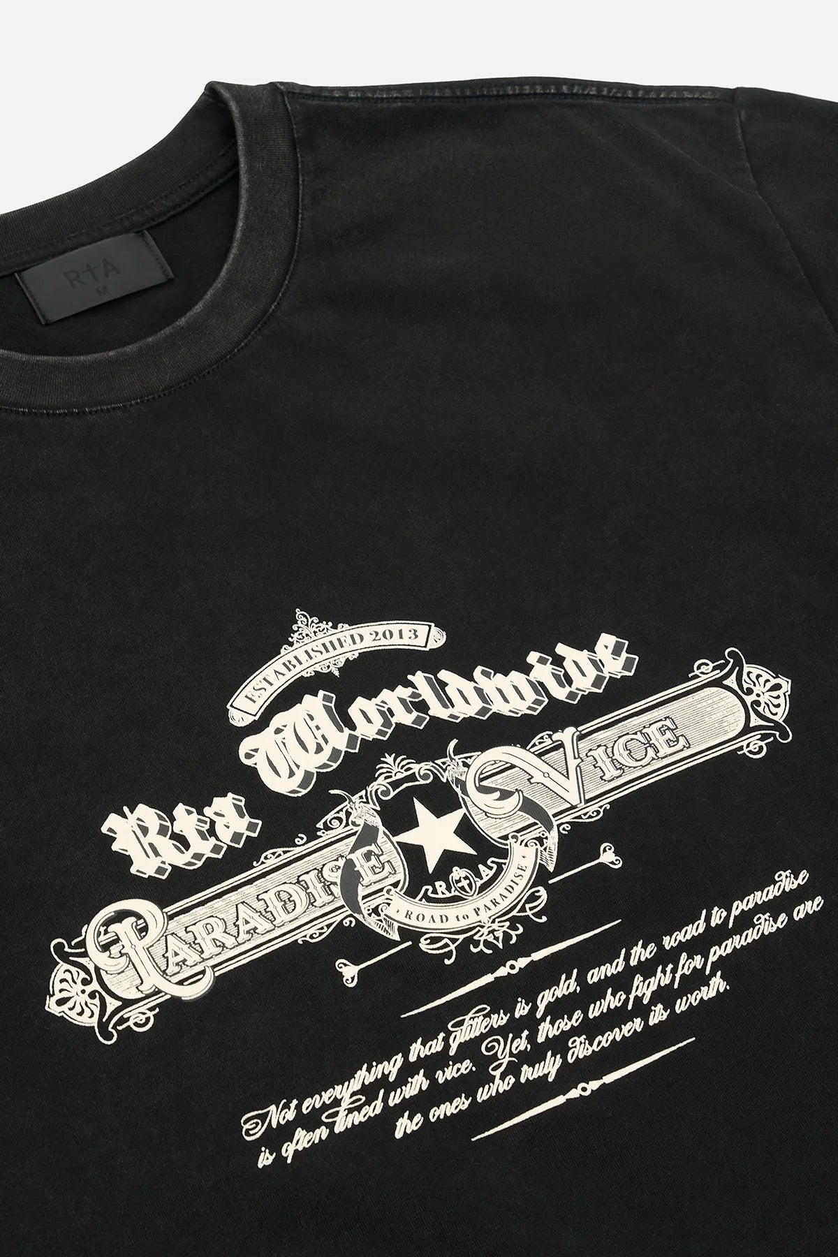 RTA Colin Oversized Short Sleeve Tee in black with retro front text graphic and RTA logo on lower back, made from 100% cotton.