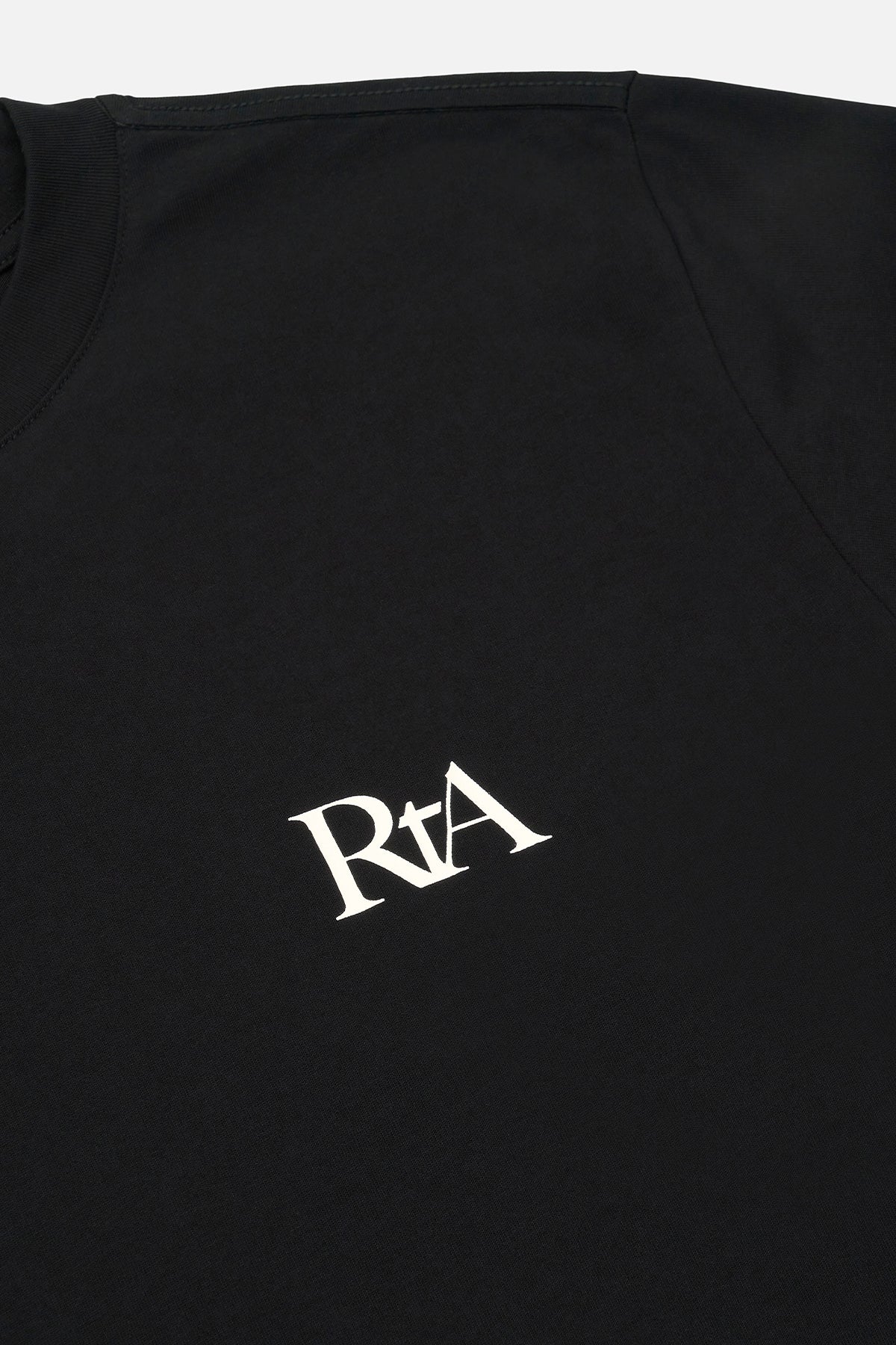 RTA Austin Short Sleeve Tee in Black Bone with cropped fit, dropped shoulders, and small chest logo, made from 100% cotton.
