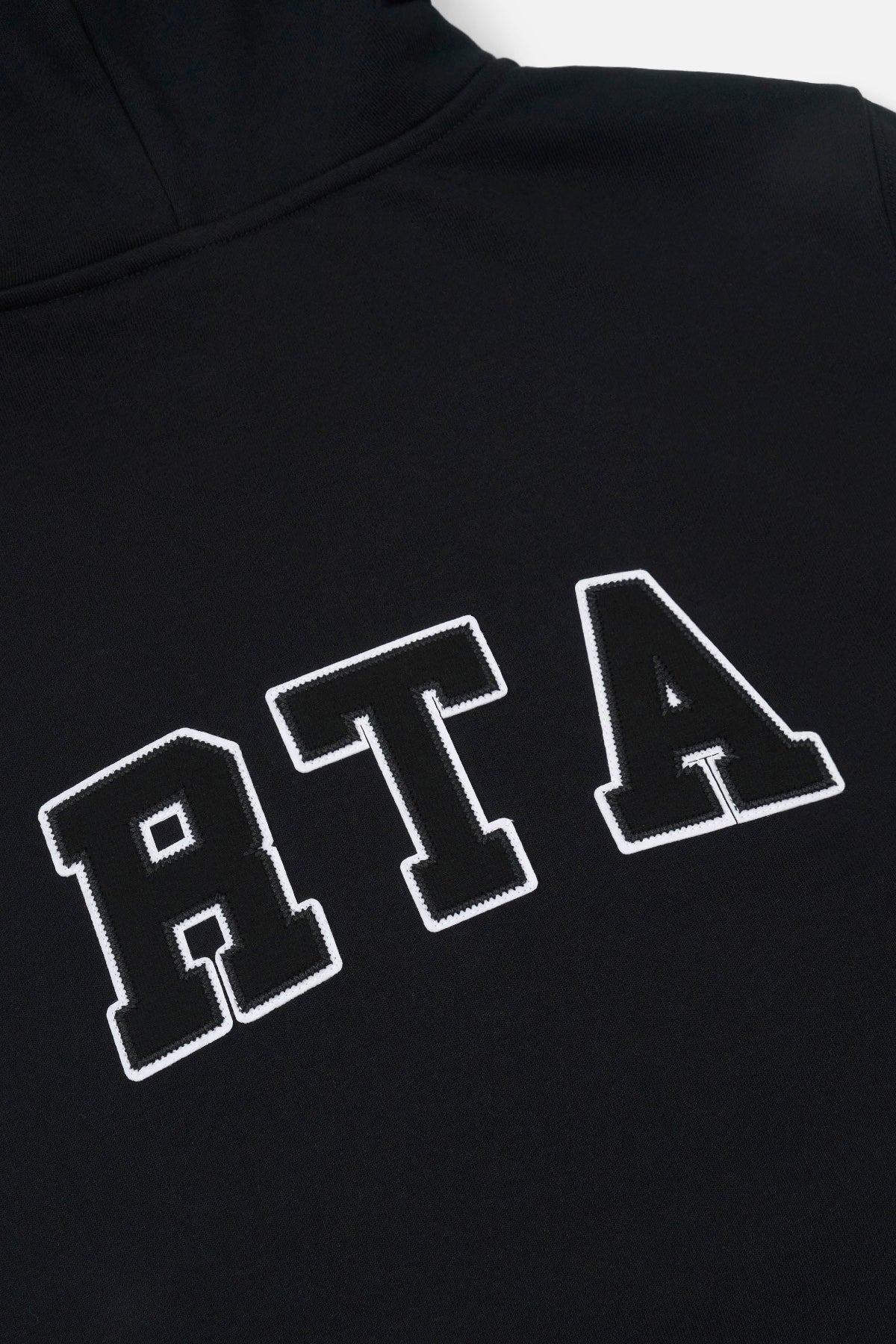 RtA Eden Hoodie in black collegiate with collegiate-inspired logo patches and front kangaroo pocket.