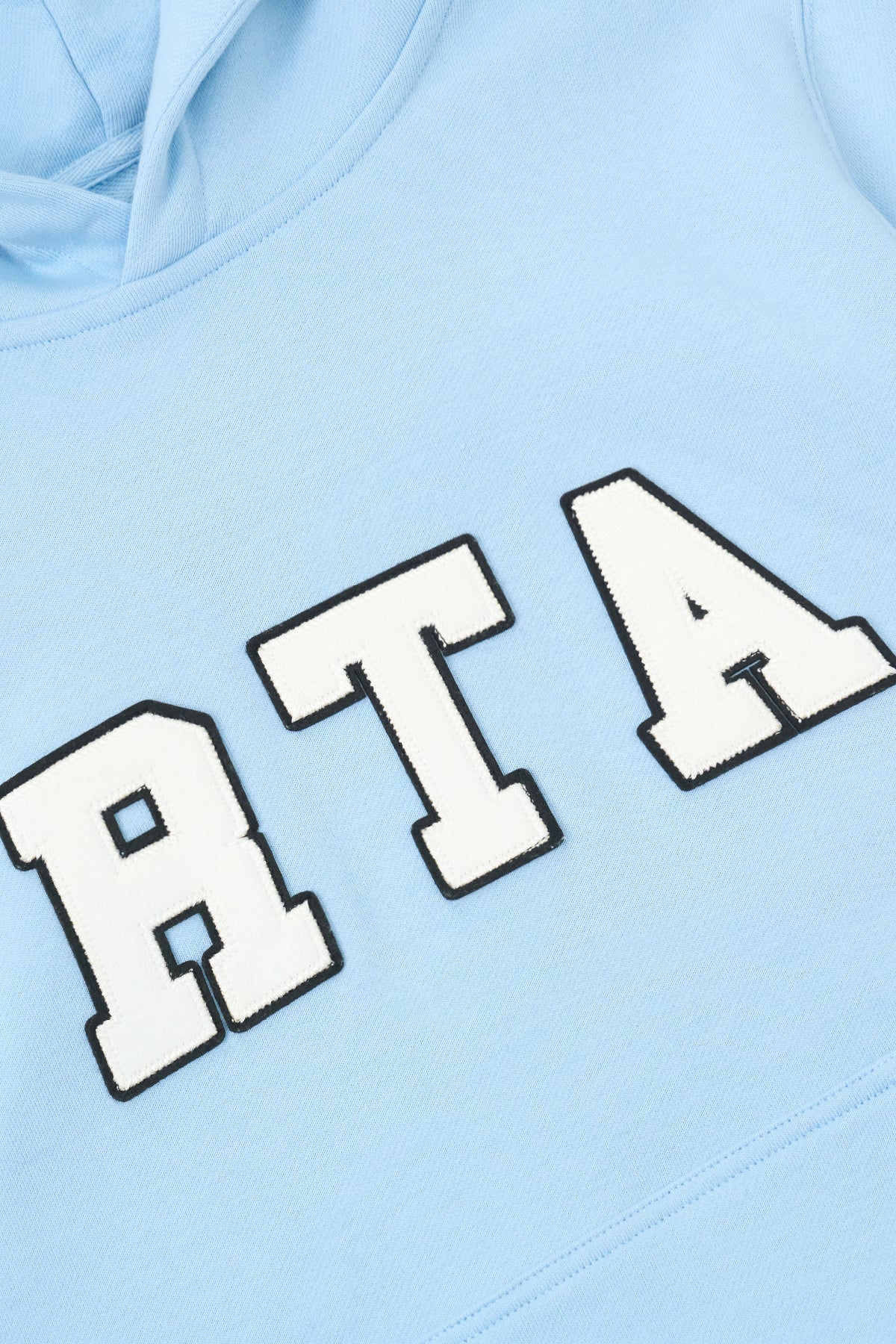 RtA Eden Hoodie in blue collegiate with collegiate-inspired logo patches and front kangaroo pocket.