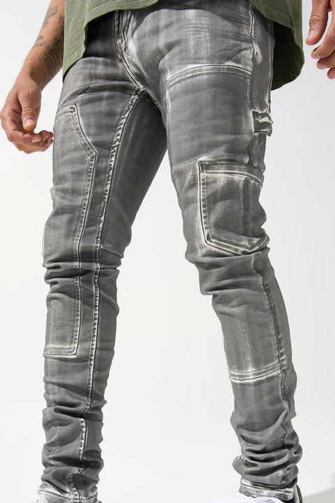 "SERENEDE® TIBURON jeans with grey overspray on white base, carpenter-style design, and unique artistic finish."