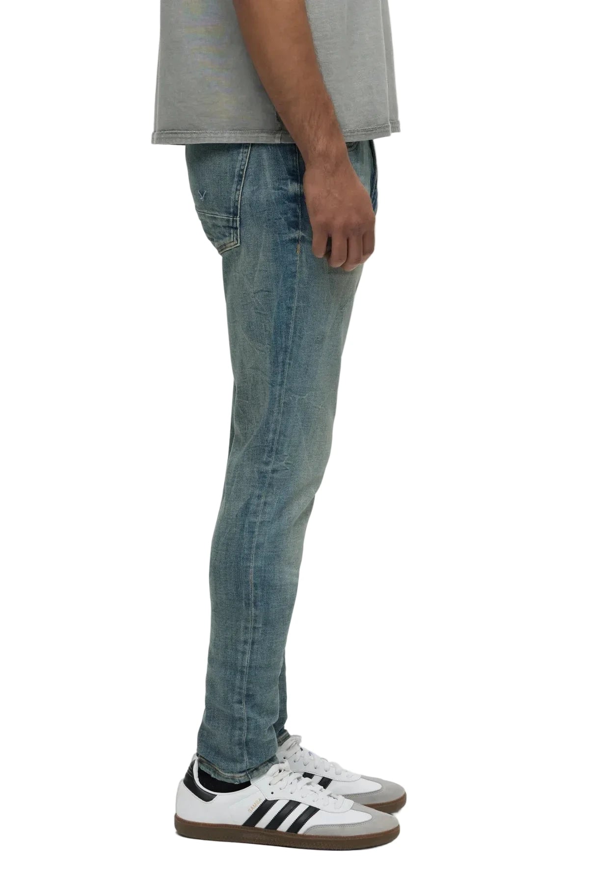 Hudson Zack Skinny Jeans in a light indigo vintage-inspired wash with subtle distressing, edge grinding, and a modern slim silhouette.