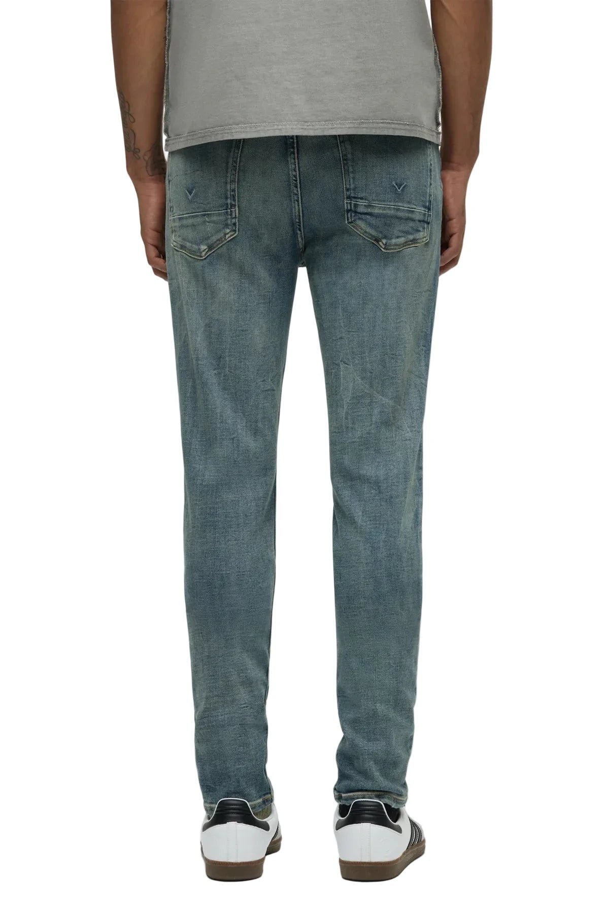 Hudson Zack Skinny Jeans in a light indigo vintage-inspired wash with subtle distressing, edge grinding, and a modern slim silhouette.