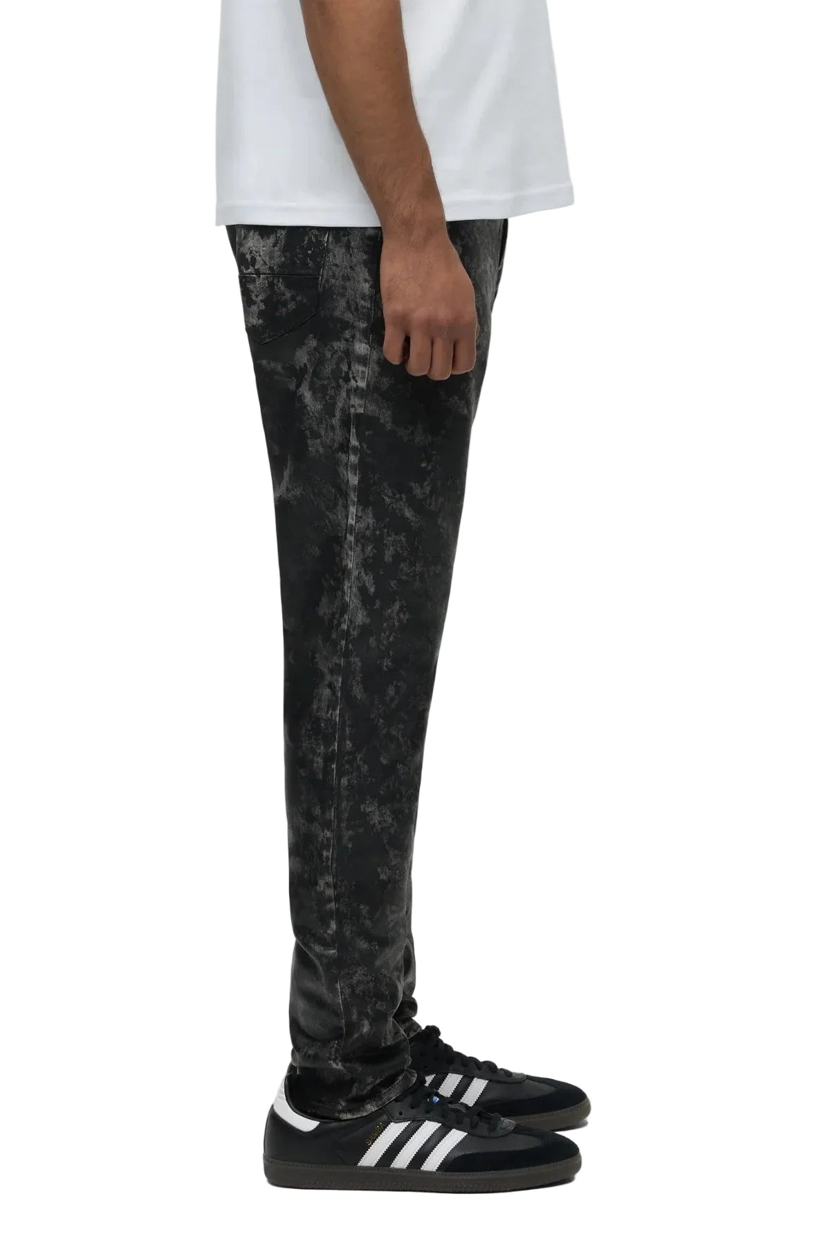 Hudson Zack Skinny Jeans in Moon Rock featuring a black-coated finish, matte black hardware, and a sleek skinny-fit silhouette.