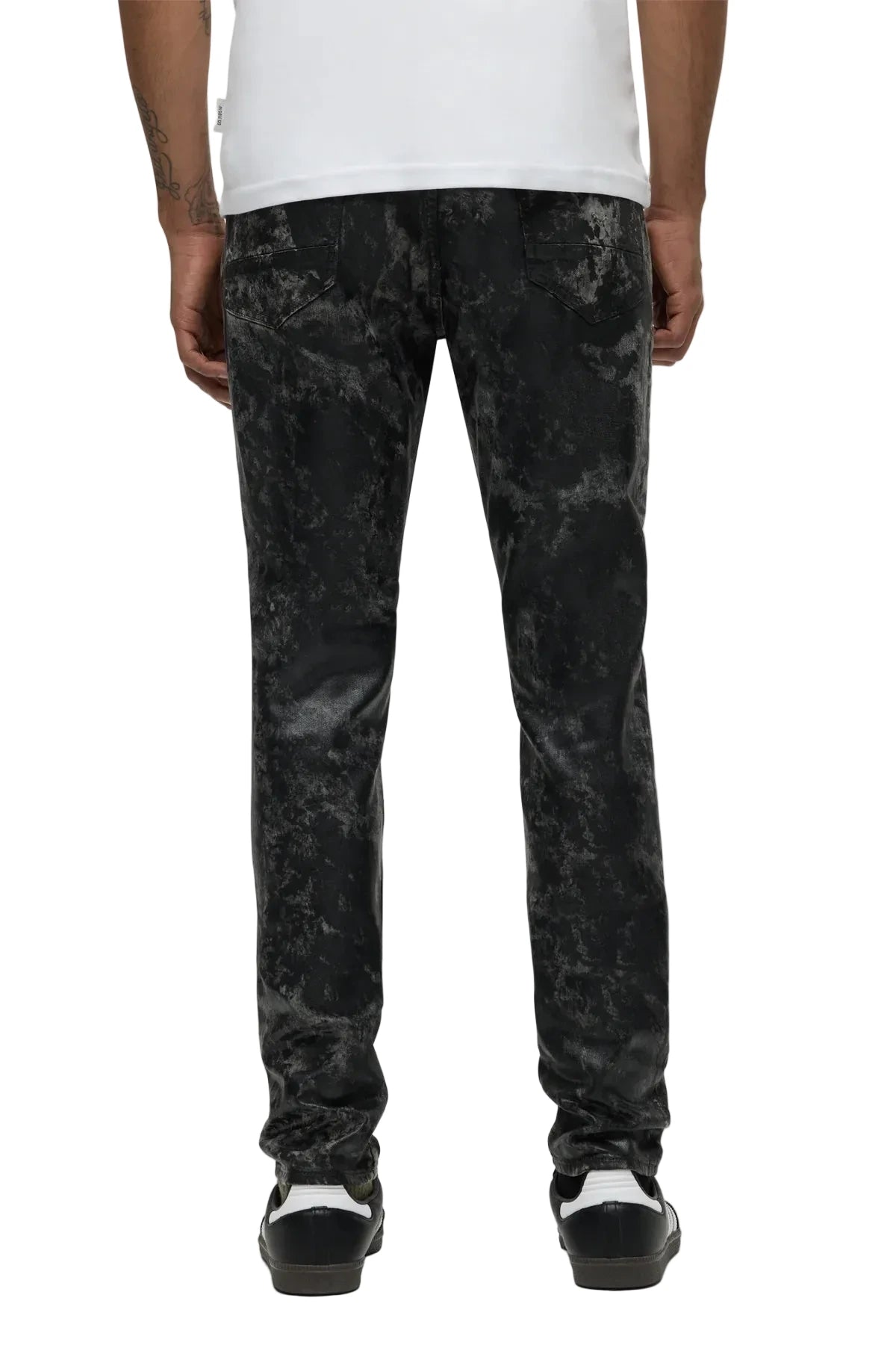 Hudson Zack Skinny Jeans in Moon Rock featuring a black-coated finish, matte black hardware, and a sleek skinny-fit silhouette.