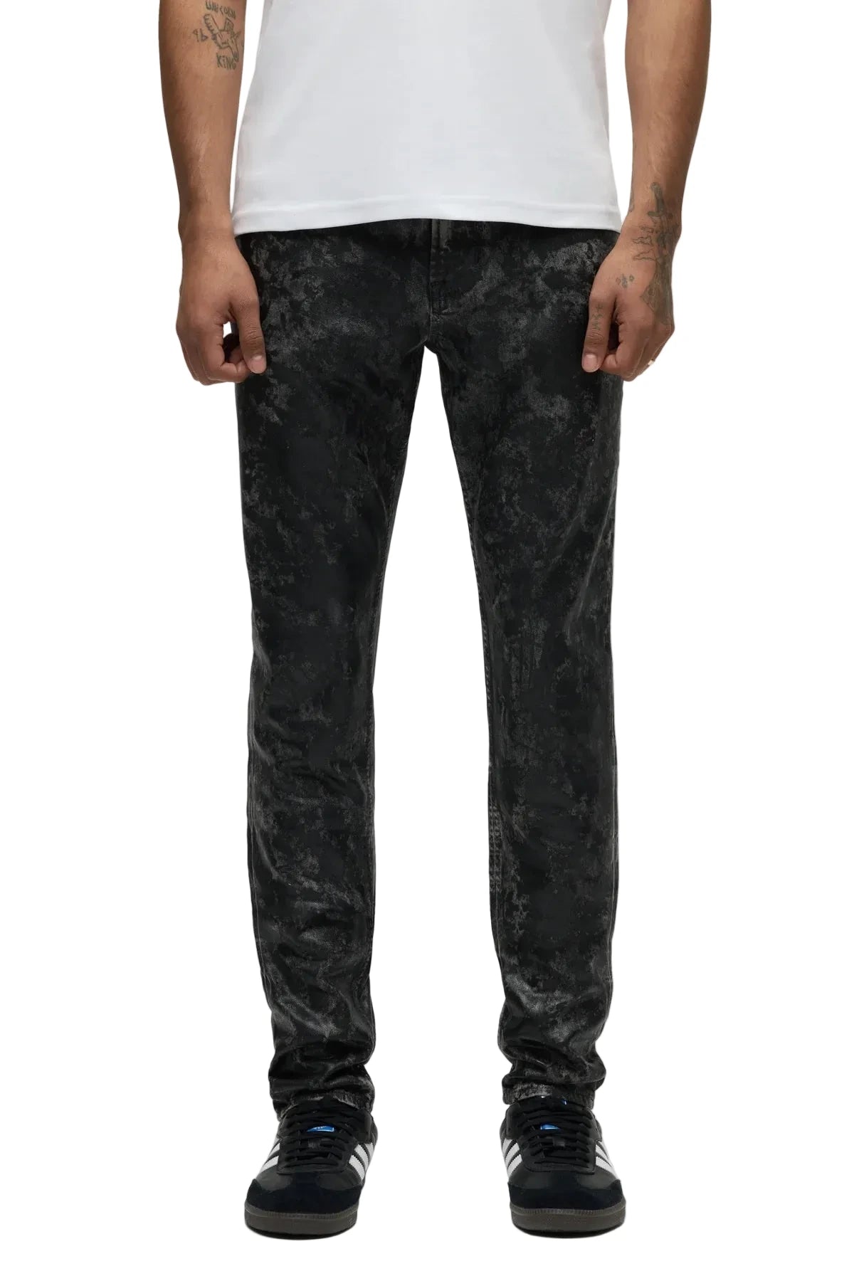 Hudson Zack Skinny Jeans in Moon Rock featuring a black-coated finish, matte black hardware, and a sleek skinny-fit silhouette.