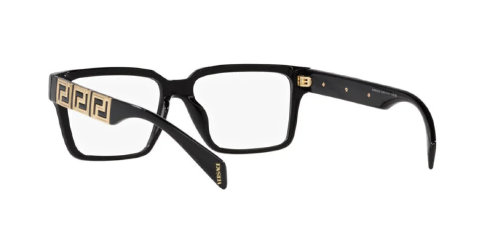 Black eyeglasses with gold accents on a white background