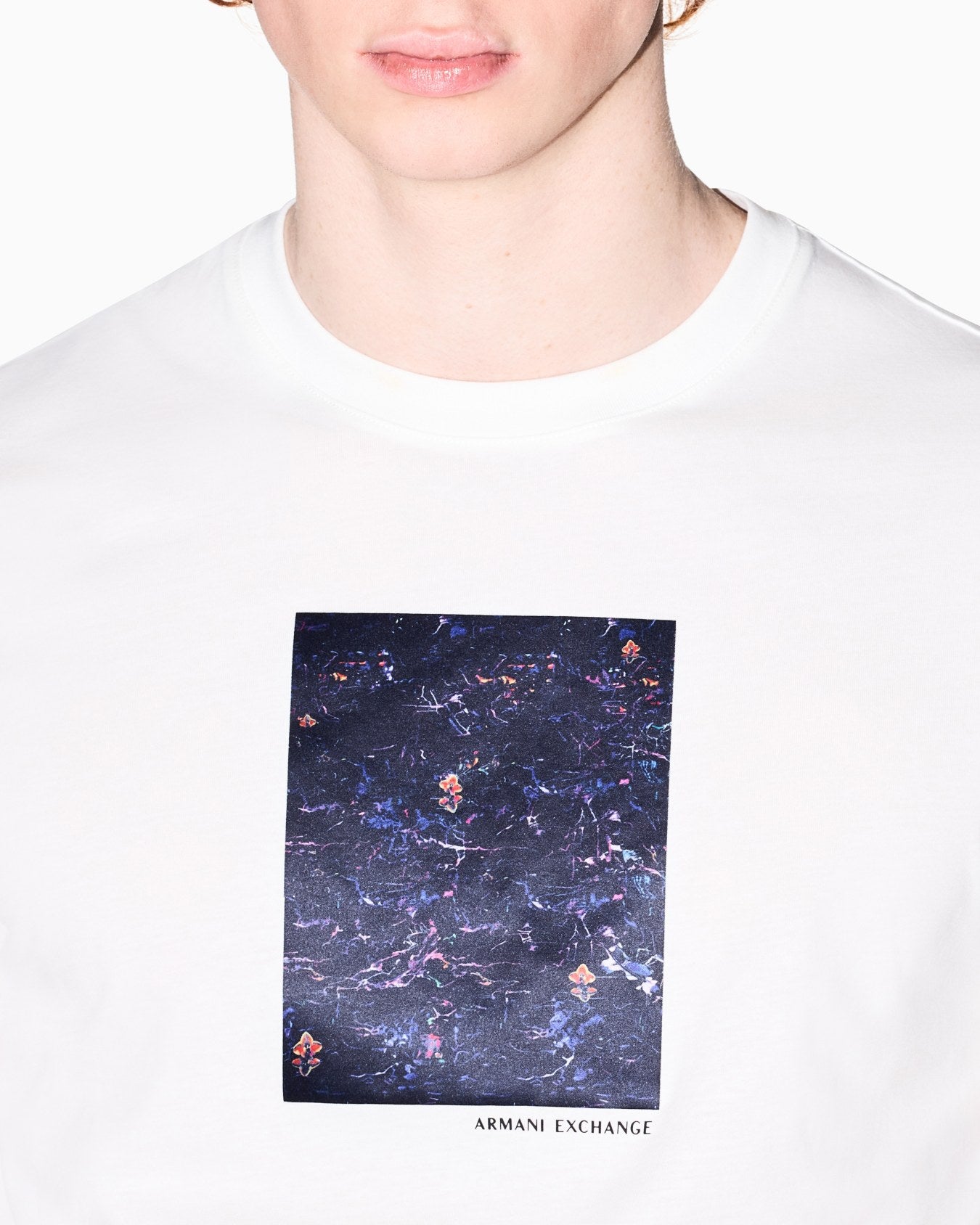 Armani Exchange regular-fit T-shirt with soft cotton jersey fabric, classic crew neck, and lightweight breathable construction.
