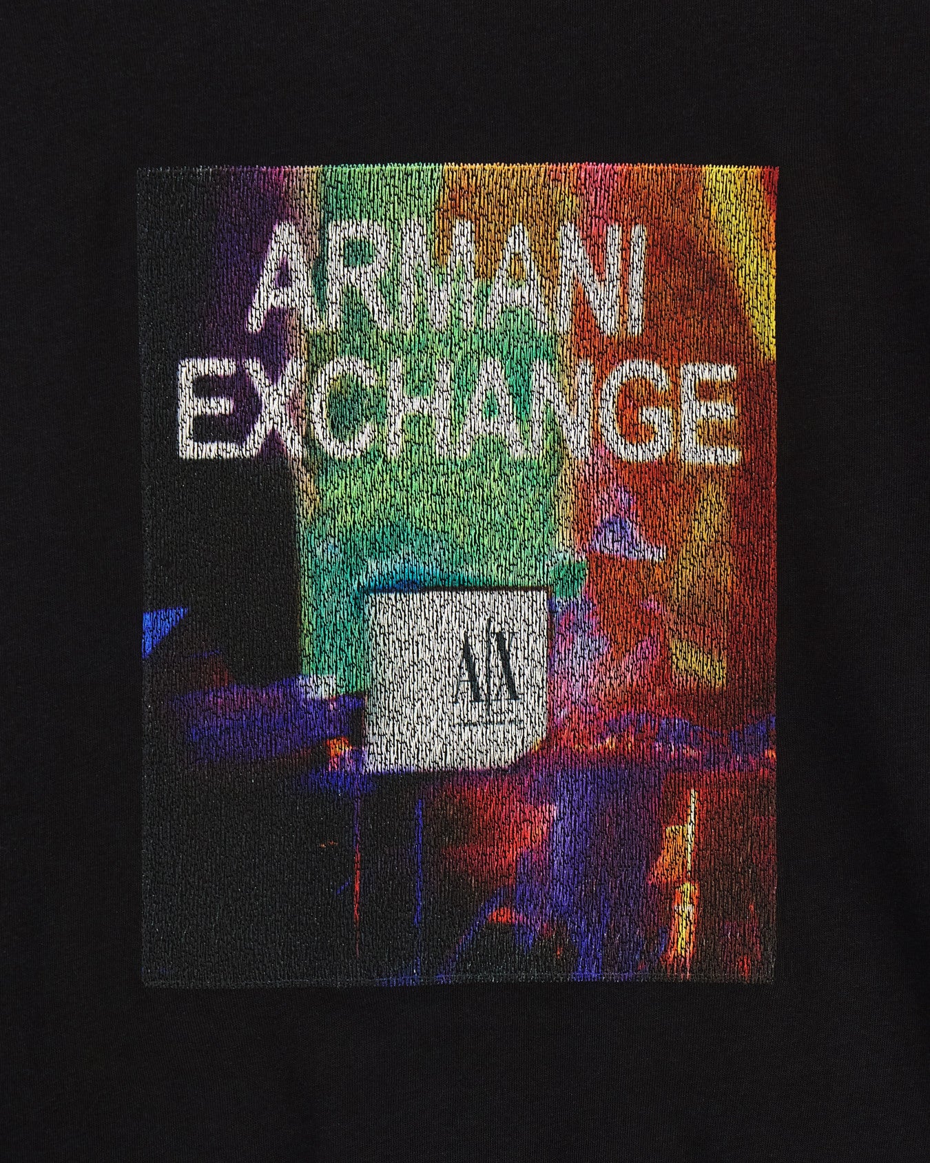 Armani Exchange slim-fit T-shirt with soft cotton jersey fabric, crew neck, and sleek modern silhouette for versatile everyday wear.