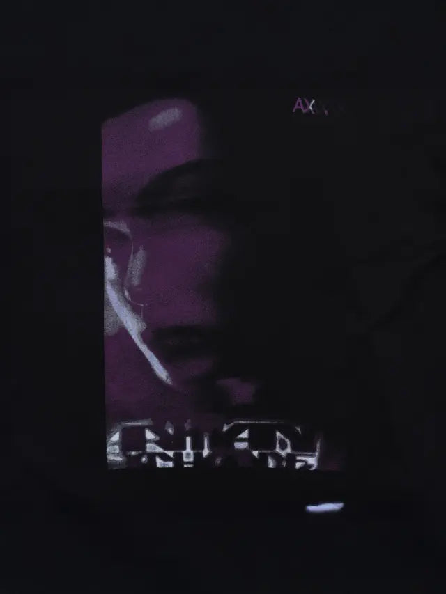 Armani Exchange black cotton T-shirt with classic crew neck, short sleeves, and modern minimal design for everyday wear.