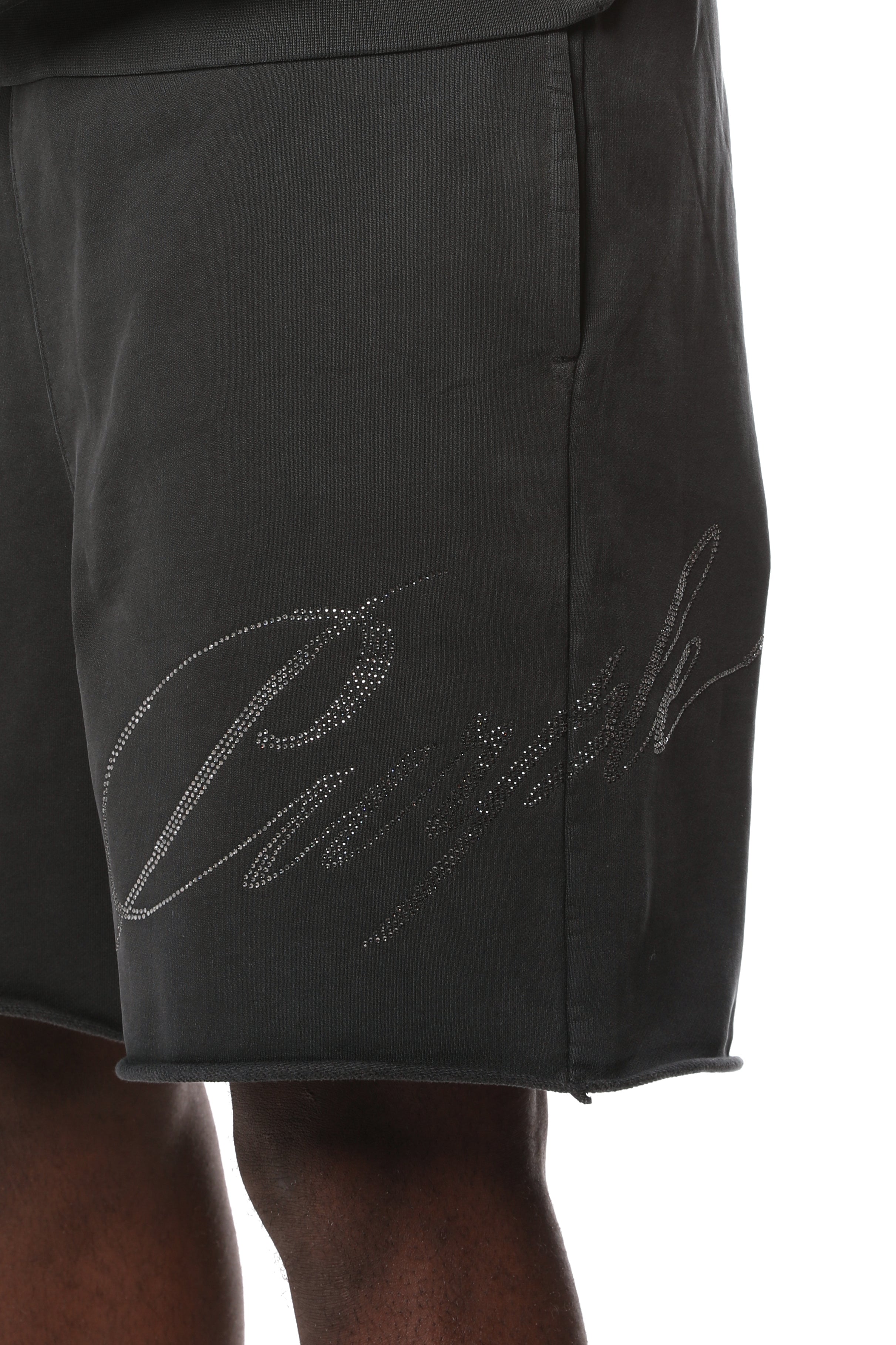 Purple Brand midweight cotton fleece shorts featuring an elasticized waistband, raw-edge hem, side slip pockets, and the signature logo at the hem.