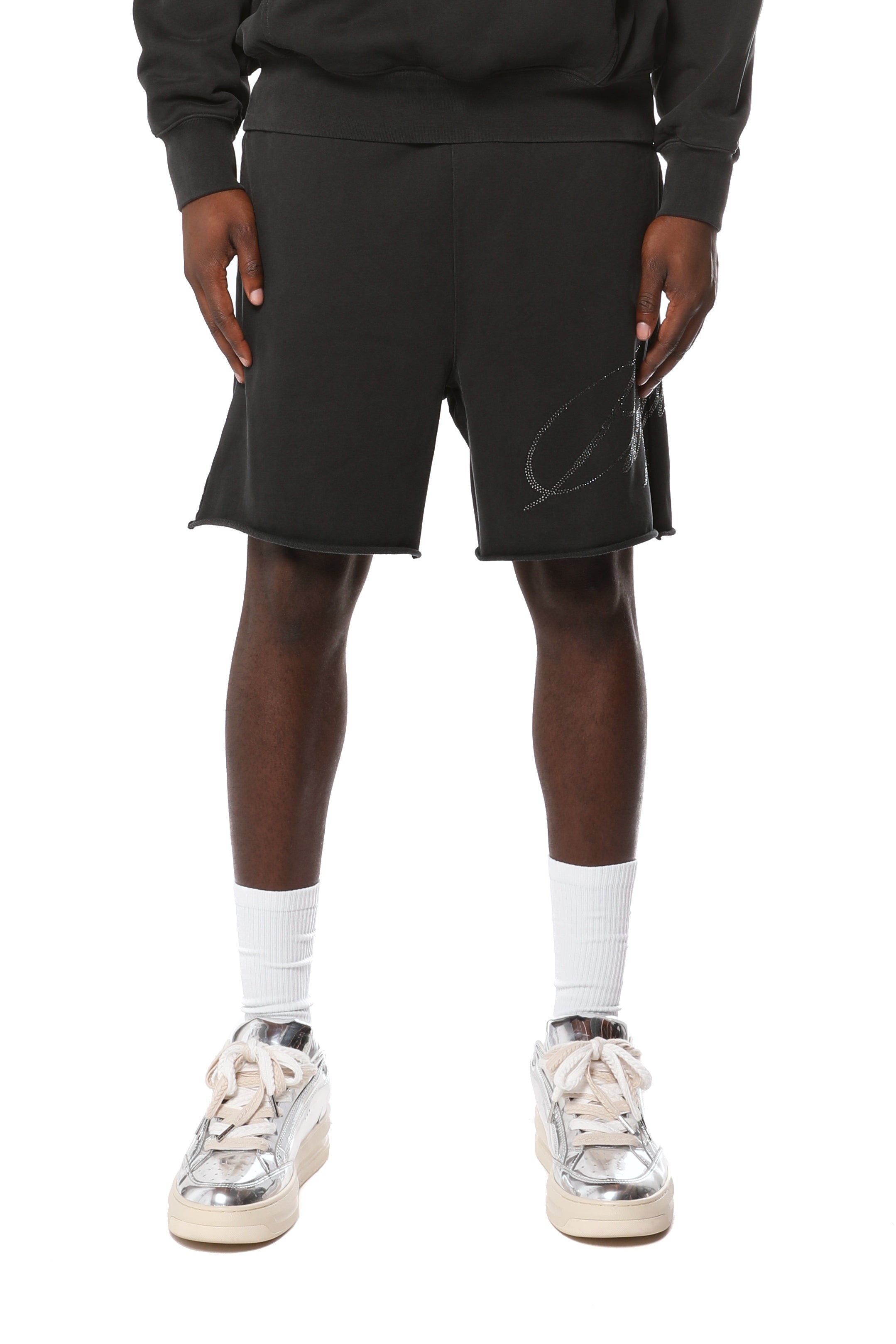 Purple Brand midweight cotton fleece shorts featuring an elasticized waistband, raw-edge hem, side slip pockets, and the signature logo at the hem.